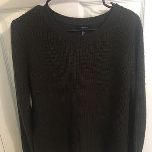 dark green sweater